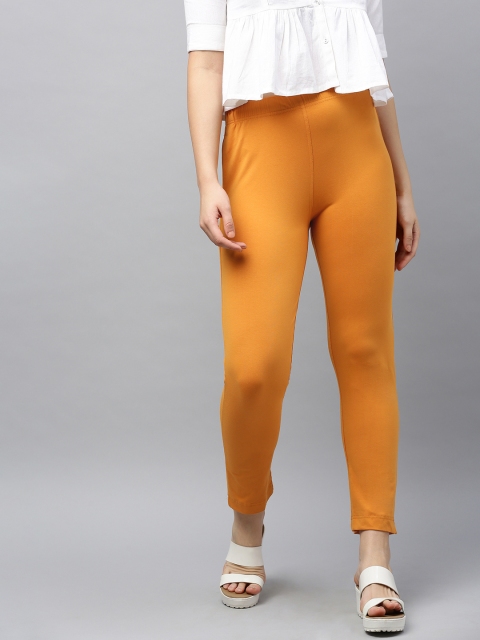 

LYRA Women Orange Solid Regular Trousers