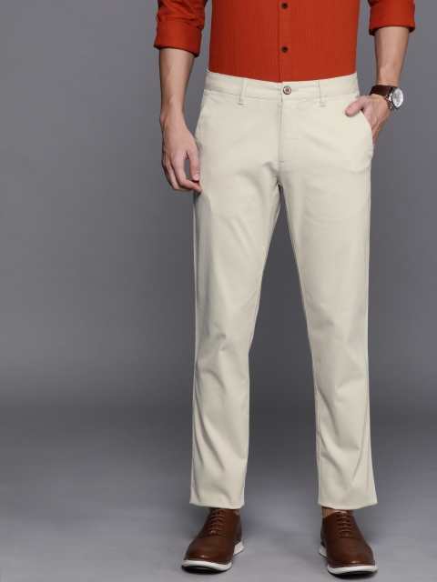 

Louis Philippe Sport Men Beige Slim Fit Self Design Regular Trousers