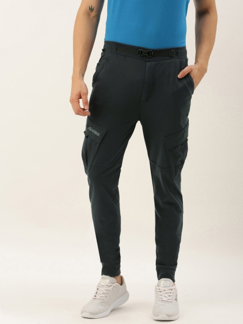 

Proline Active Men Charcoal Grey Slim Fit Solid Joggers with Side Bellow Pockets