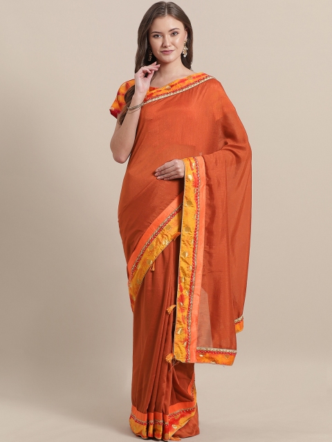 

Mitera Rust Orange Solid Tussar Saree