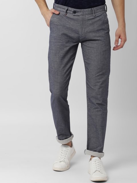 

Peter England Men Navy Blue & White Slim Fit Self Design Regular Trousers