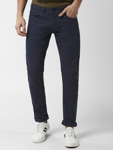 

Peter England Men Navy Blue Skinny Fit Self Design Regular Trousers
