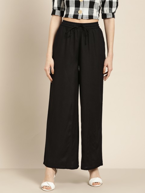 

Moda Rapido Women Black Solid Flared Palazzos