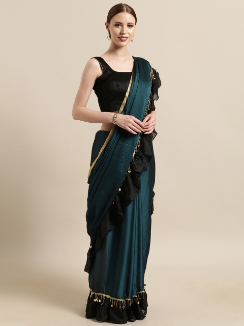 

Tikhi Imli Teal Green Solid Poly Crepe Solid Embellished Saree With Tassels