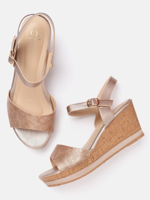 

Carlton London Women Rose Gold-Toned Snakeskin Textured Wedges