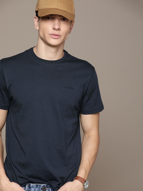 

Calvin Klein Jeans Men Navy Blue Solid Round Neck T-shirt