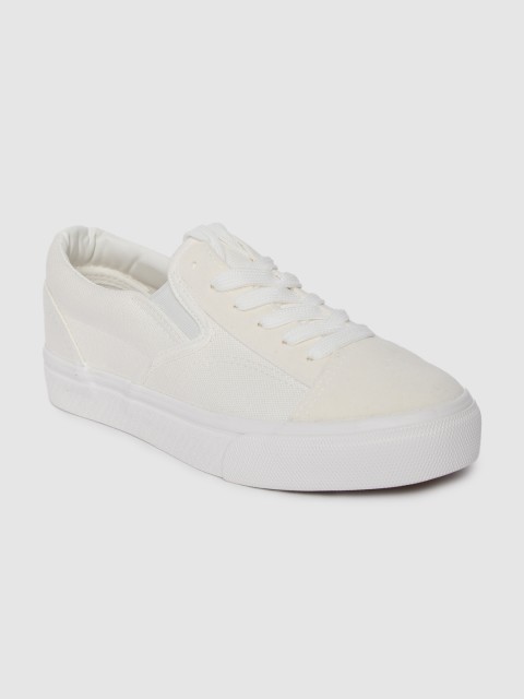 

Roadster Women Off-White Solid Sneakers