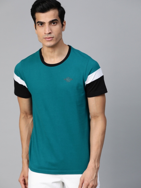 

Roadster Men Teal Blue Solid Round Neck T-shirt
