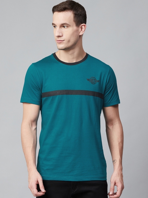 

Roadster Men Teal Blue Solid Round Neck T-shirt