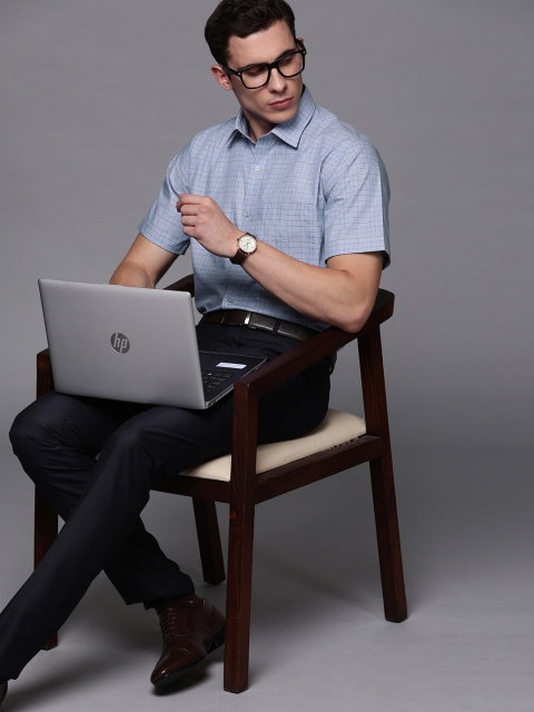 

Raymond Men Blue Contemporary Fit Checked Formal Shirt
