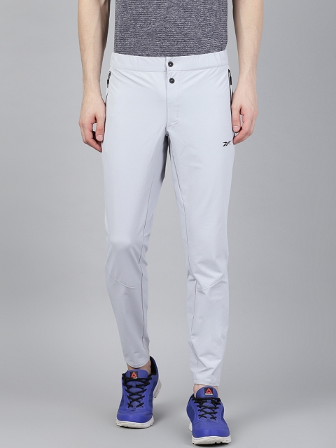 

Reebok Men Grey Solid Sweatpants Training Track Pants