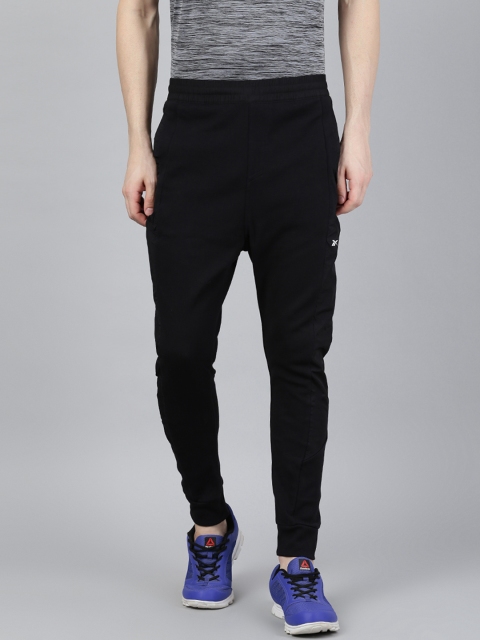 

Reebok Men Black Solid Knit- Woven Joggers