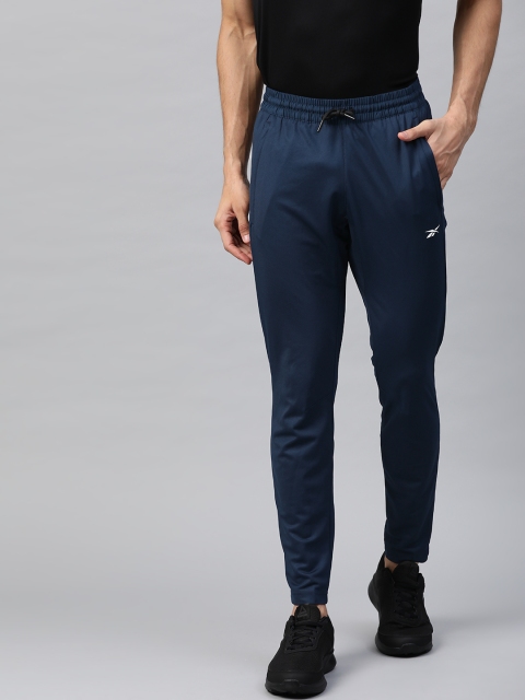 

Reebok Men Navy Blue Workout Knitted Solid Track Pants