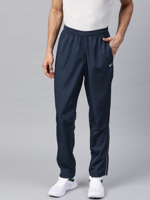 

Reebok Men Navy Blue Foundation Woven Solid Training Track Pants