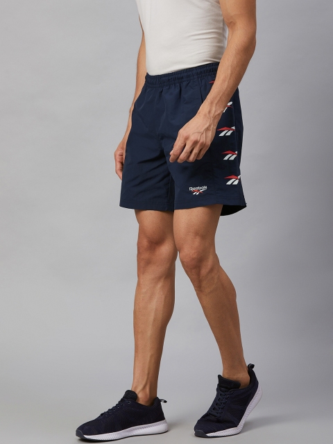 

Reebok Classic Men Navy Blue Woven Shorts