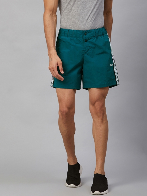 

Reebok Men Teal Green Meet You There Solid Shorts