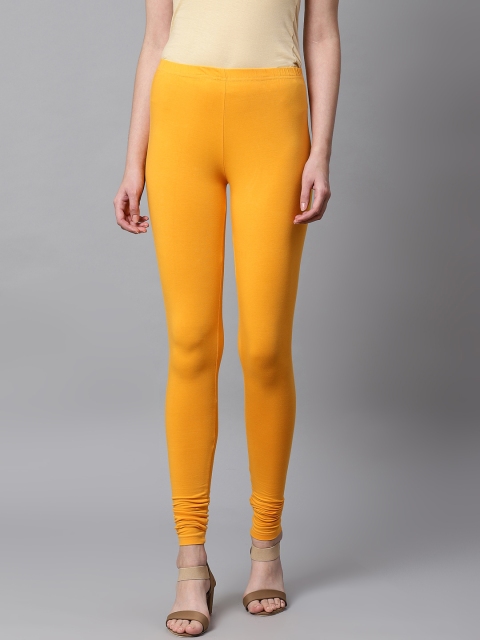 

Kifahari Women Mustard Yellow Solid Churidar Length Leggings