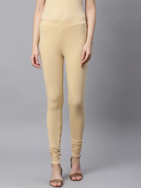 

Kifahari Women Beige Solid Churidar Length Leggings