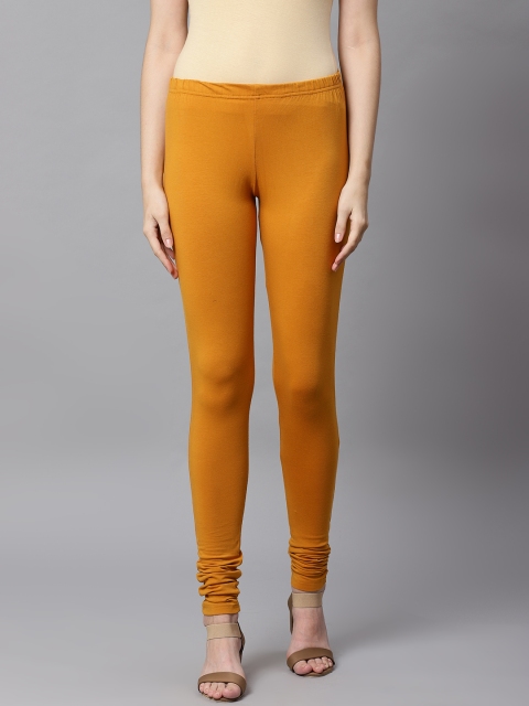 

Kifahari Women Mustard Yellow Solid Churidar Length Leggings