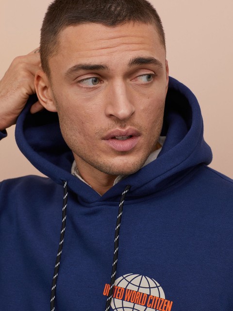 

H&M Men Blue Printed hooded top