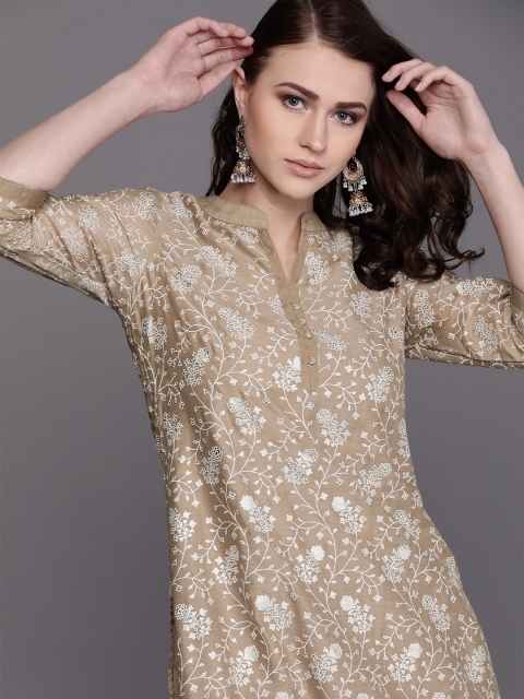 

AKS Couture Women Beige & White Printed Kurta with Palazzos