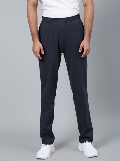 

Reebok Men Navy Blue Solid Training Essentials Track Pants