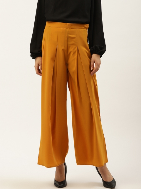 

Cottinfab Women Mustard Yellow Comfort Flared Solid Parallel Trousers