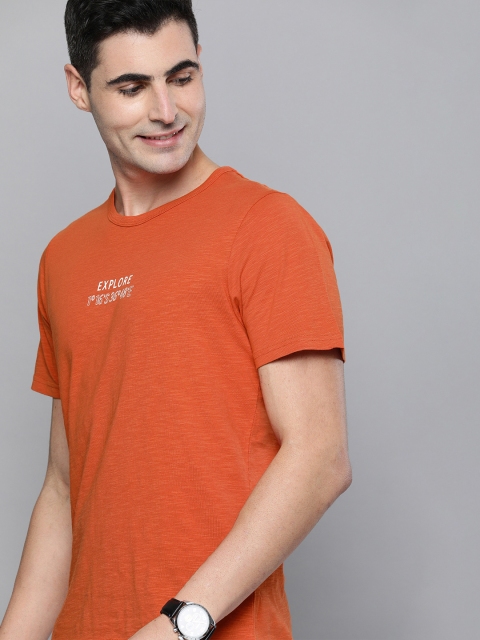 

Mast Harbour Men Orange Solid Round Neck Pure Cotton T-shirt with Printed Detail