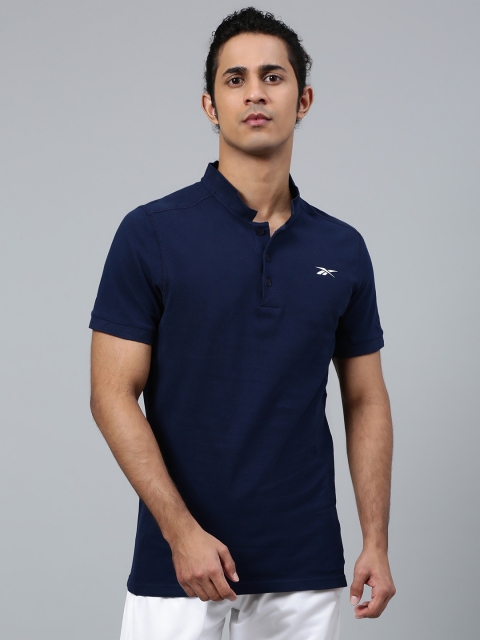 

Reebok Men Navy Blue Solid Workout Mod Polo T-Shirt