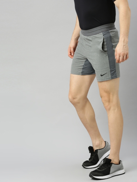 

Nike Men Grey Solid Regular Fit Yoga Shorts
