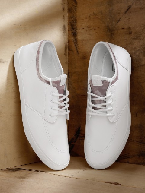 

Roadster Men White Solid Sneakers