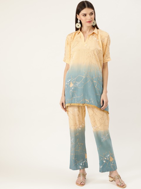

Moda Rapido Women Cream-Coloured & Blue Dyed Printed Kurti with Palazzos