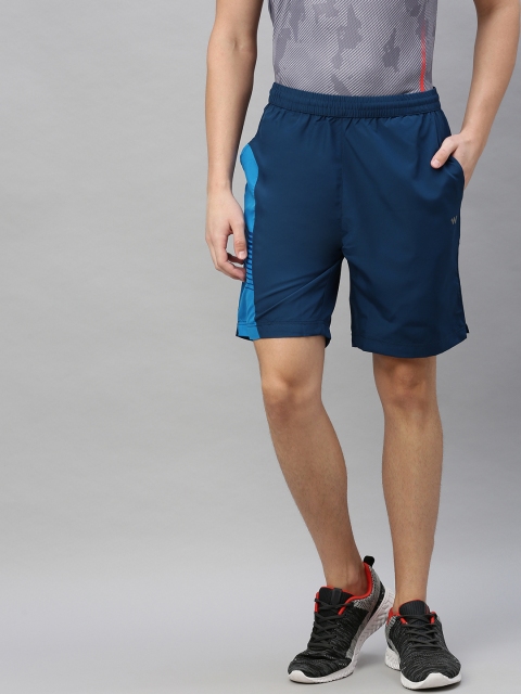 

Wildcraft Men Teal Solid Regular Fit Regular Shorts