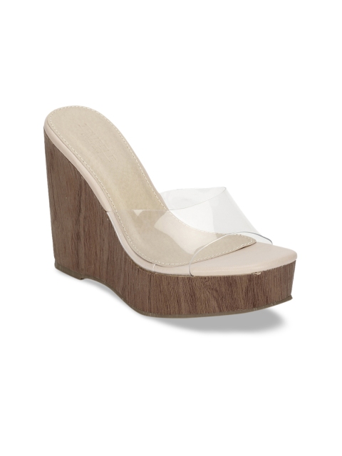 

Truffle Collection Women Transparent Solid Wedges