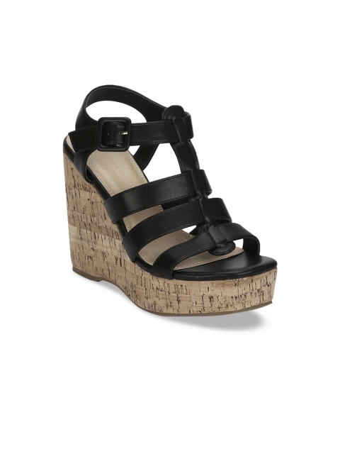 

Truffle Collection Women Black Solid Wedges