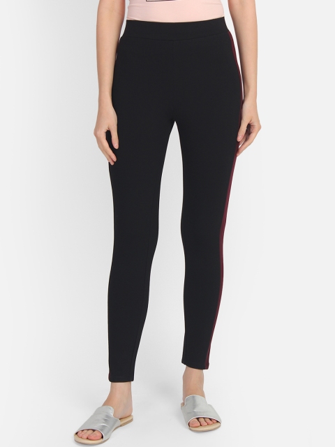 

COVER STORY Women Black & Red Solid Ankle-Length Leggings