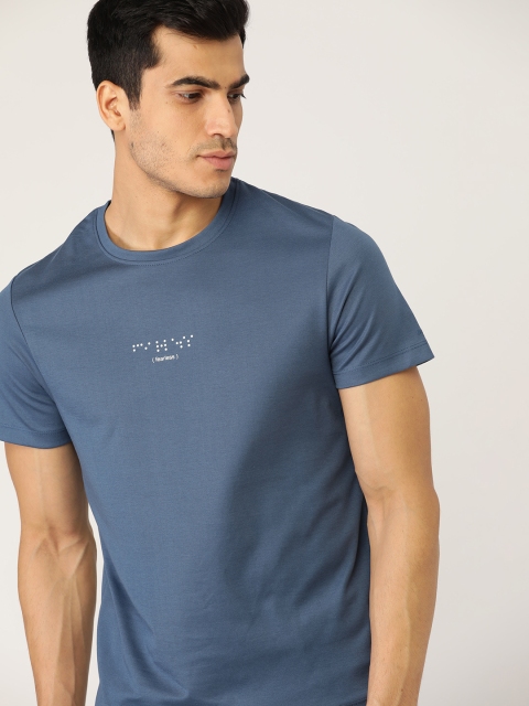 

ether Men Blue Solid Round Neck T-shirt