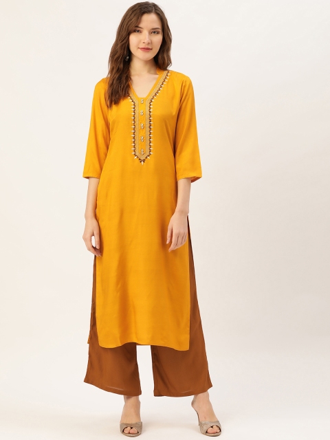 

Jaipur Kurti Women Mustard Solid Kurta with Palazzos
