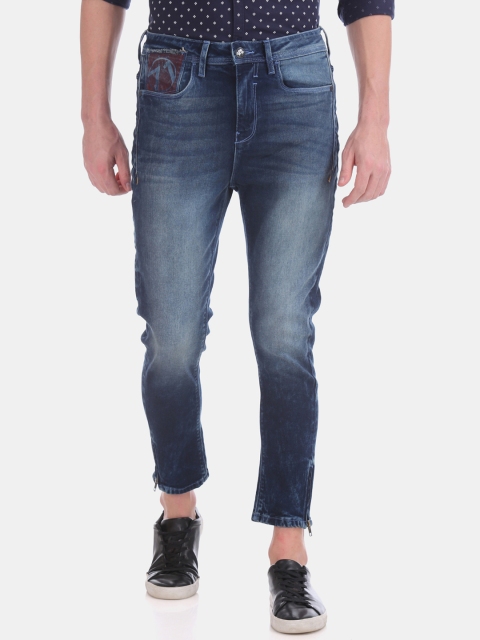 

Ed Hardy Men Navy Blue Tapered Fit Mid-Rise Clean Look Stretchable Jeans