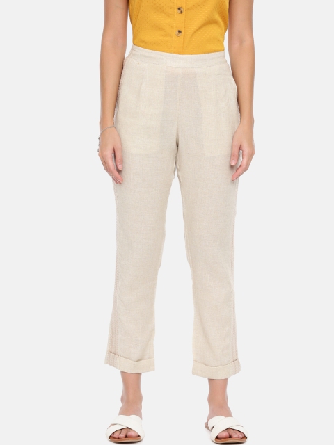 

Chumbak Women Beige Tapered Fit Solid Regular Trousers