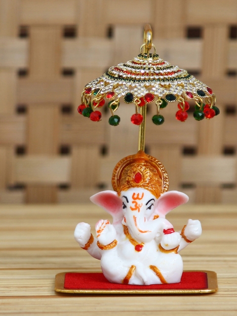 

eCraftIndia White & Red Decorative Lord Ganesha Idol With Designer Chatri Showpiece