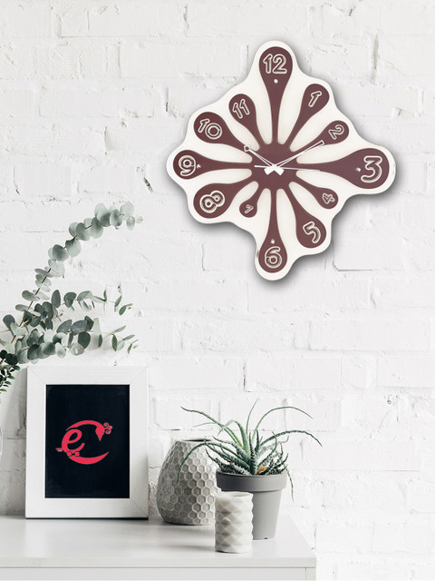 

eCraftIndia Brown Abstract Shaped Printed Analogue Wall Clock (50.8 x 48.26 x 5.08)