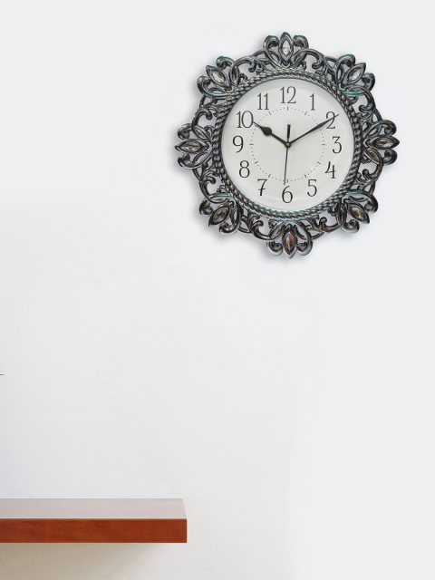 

eCraftIndia Silver-Toned Quirky Solid Analogue Wall Clock 40 cm x 40 cm