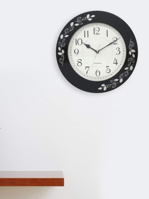 

eCraftIndia Black Round Solid Analogue Wall Clock 34cm x 34cm