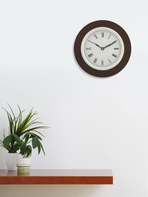 

eCraftIndia Brown Round Solid Analogue Wall Clock 21cm x21cm