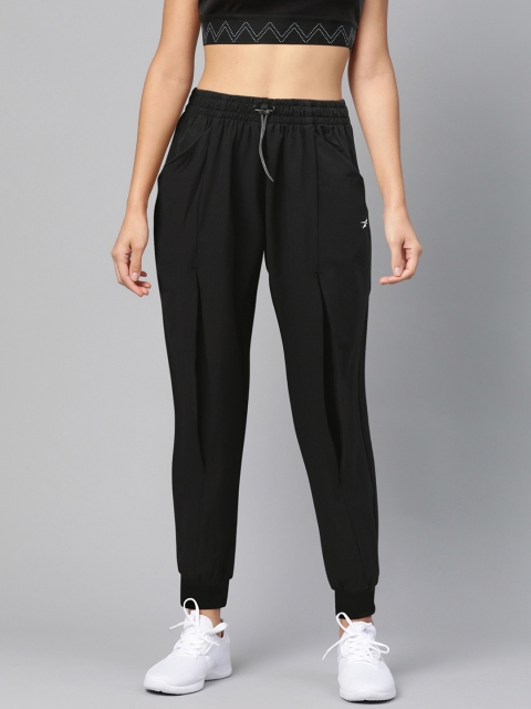 

Reebok Women Black Supply Woven Solid Training Joggers