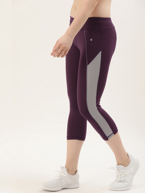 

ether Women Burgundy Solid Three-Fourth e-Dry Technology Tights with Side Stripe Detailing