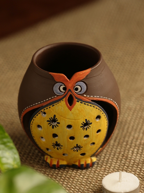 

ExclusiveLane Brown & Yellow Owl Carved Terracotta Tea Light Holder