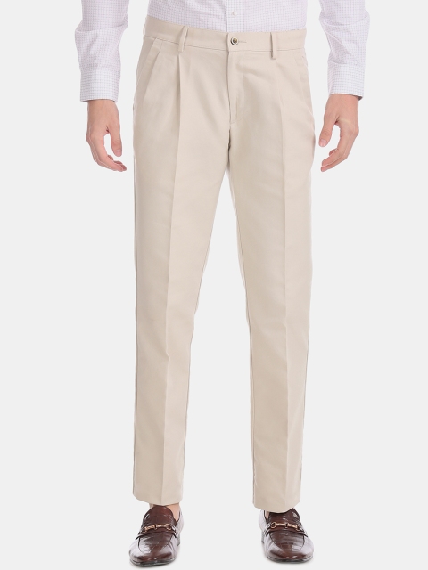 

Arrow Sport Men Beige Regular Fit Solid Formal Trousers
