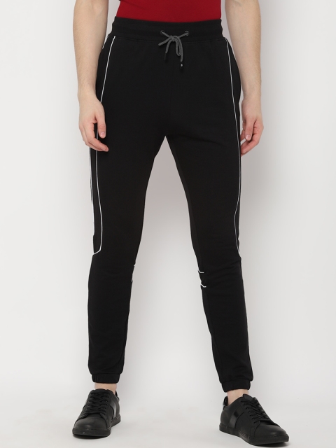 

SKULT by Shahid Kapoor Men Black Solid Slim-Fit Joggers